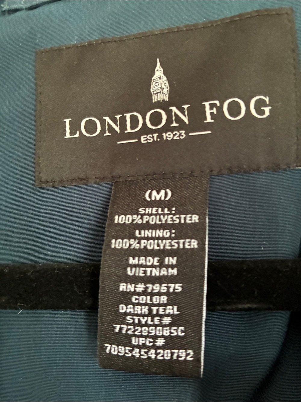 London Fog womens navy blue raincoat.